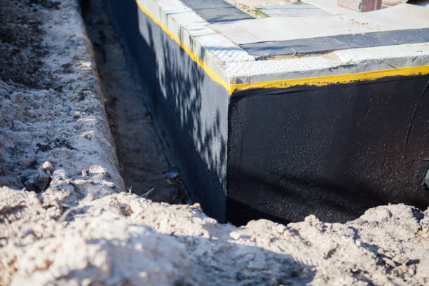 Professional Waterproofing technician working in Hartsville, SC